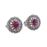 A pair of ruby and diamond cluster ear studs