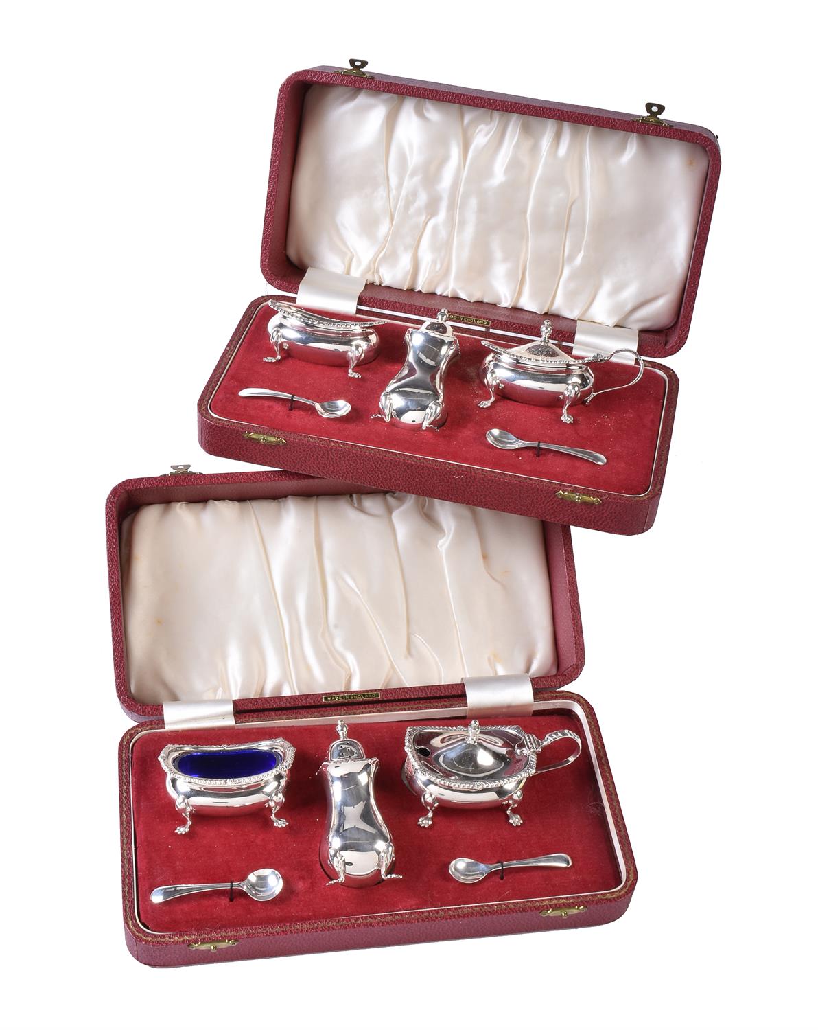 Two silver three piece cruet sets by Barker Ellis Silver Co.