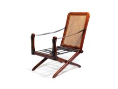 A mahogany reclining armchair