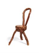 A rustic bentwood and natural form chair