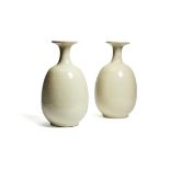 A pair of white-glazed porcelain vases