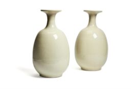 A pair of white-glazed porcelain vases