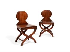 A pair of Regency mahogany hall chairs