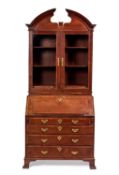 A fine George II walnut crossbanded mahogany bureau cabinet