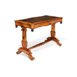 An early Victorian bird's-eye maple and parcel ebonised writing table