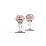 A pair of English lobed glass decorative chimney piece ornaments