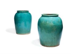 A pair of oversized turquoise glazed stoneware vases