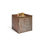 A hammered copper log bin