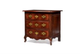 A Continental mahogany commode