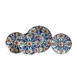 Four various Dutch Delft polychrome plates