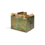 A verdigris sheet copper log bin