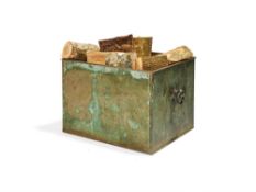 A verdigris sheet copper log bin