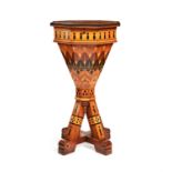 Y A Fine Reformed Gothic walnut and specimen parquetry inlaid trumpet work table