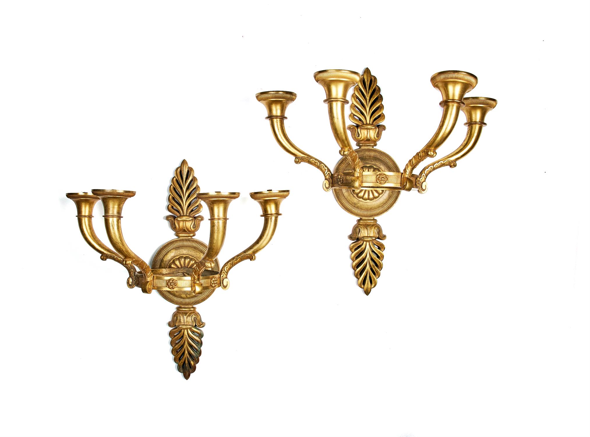 A pair of French gilt bronze four light wall appliques in Charles X taste