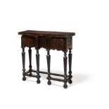 An oak gate-leg table