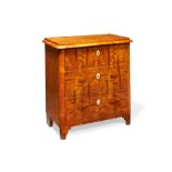 A Biedermeier birch chest of drawers