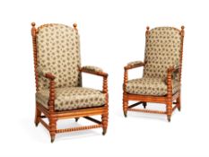 A pair of maple and bird's-eye maple armchairs