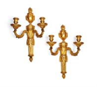 A pair of fine Louis XVI gilt bronze twin light wall appliques to the design by Jean-Louis Prieur (1