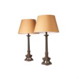 A pair of French cast iron lamp bases in Louis Philippe taste