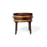 A George III mahogany and brass bound wine cooler