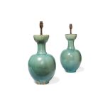 A pair of Chinese turquoise glazed pottery baluster vases fitted as table lamps