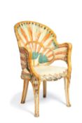 An Indian white and polychrome painted wood armchair in Egyptian Revival taste