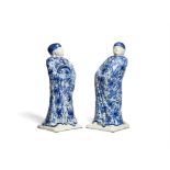 A pair of Delft type blue and white figures of Chinamen