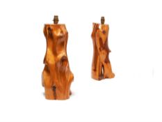 A companion pair of similar solid yew lamp bases