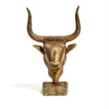 A Continental carved alabaster model of a bull's head in Minoan style