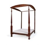 A George IV mahogany and pine four poster bed frame