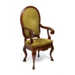 A Regency green painted and parcel giltwood armchair