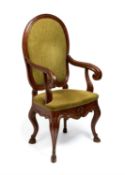 A Regency green painted and parcel giltwood armchair