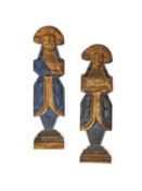 A pair of painted and parcel gilt oak figural furniture mounts in late 17th century style