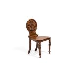 An early Victorian elm and burr elm hall chair