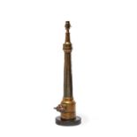 A brass firehose nozzle by John Morris & Sons refitted as a table lamp