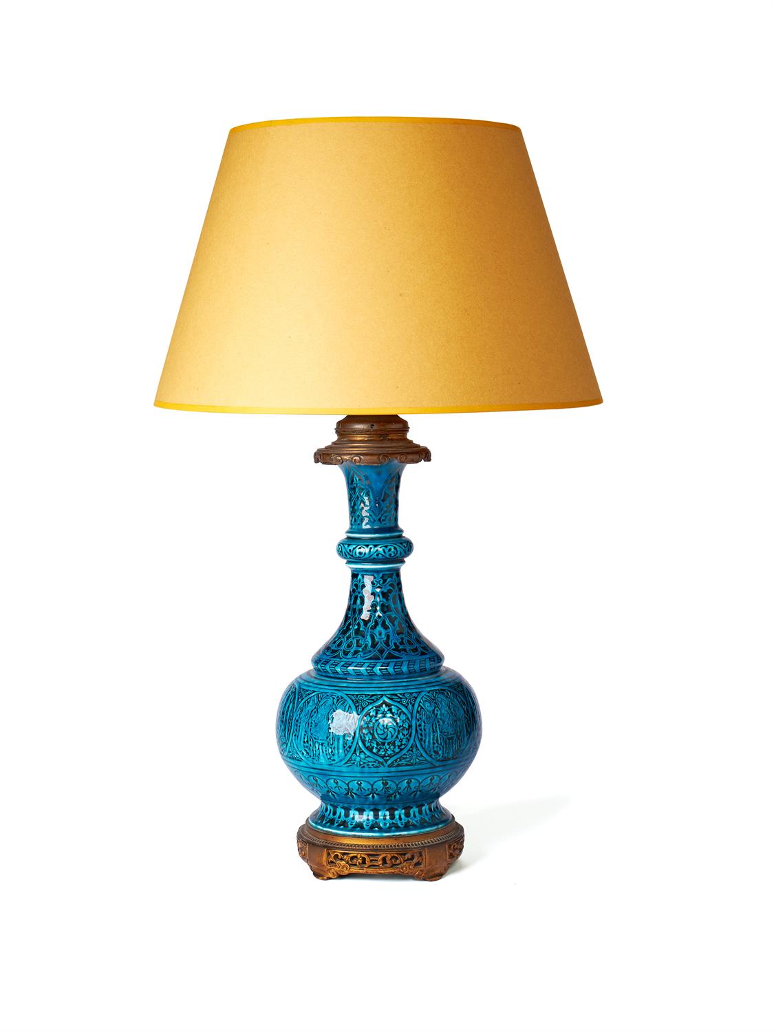 An Aesthetic Movement French faience and gilt bronze mounted table lamp