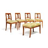 A set of four birch side chairs in early 19th Continental century style