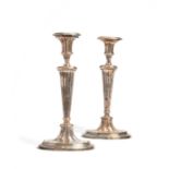 A pair of Sheffield plate candlesticks