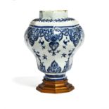 A faceted Rouen blue and white Rouen vase