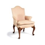 A mahogany and upholstered armchair