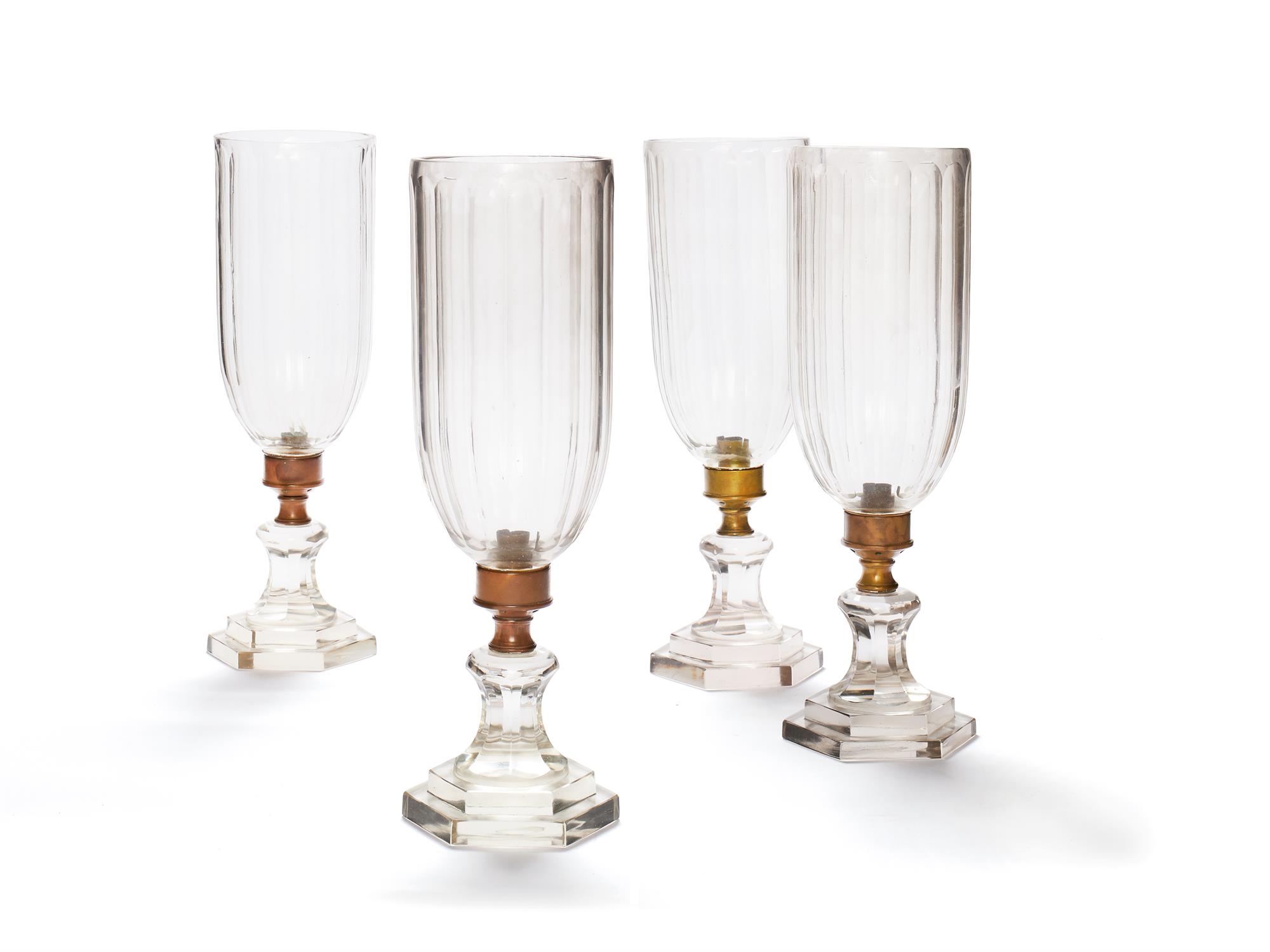 A set of four modern cut glass and metal mounted storm shades in Regency style