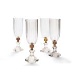 A set of four modern cut glass and metal mounted storm shades in Regency style