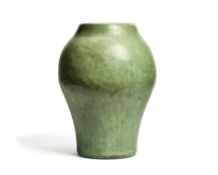 A modern green-glazed red pottery vase