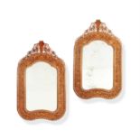 A pair of Victorian walnut wall mirrors