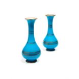 A pair of turquoise-blue opalescent glass vases