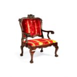 A Portuguese hardwood and red velvet upholstered armchair