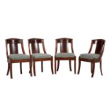 A set of four French Empire mahogany side chairs