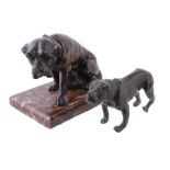 A patinated bronze model of a seated mastiff