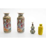 Two similar Chinese famille rose vases and two scent bottles