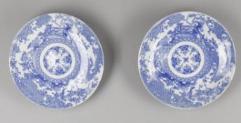 A pair of Japanese Arita blue and white printed porcelain chargers